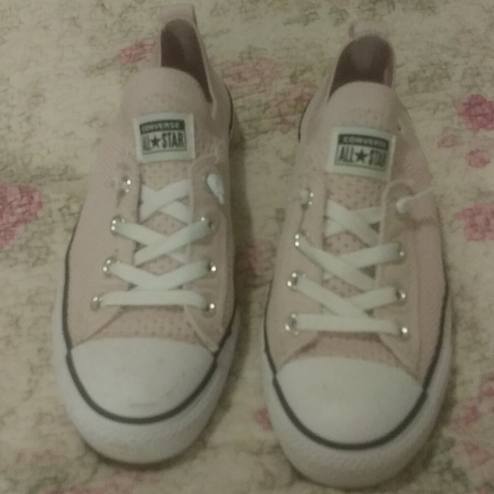 Converse pink stretchy slip on shoes.